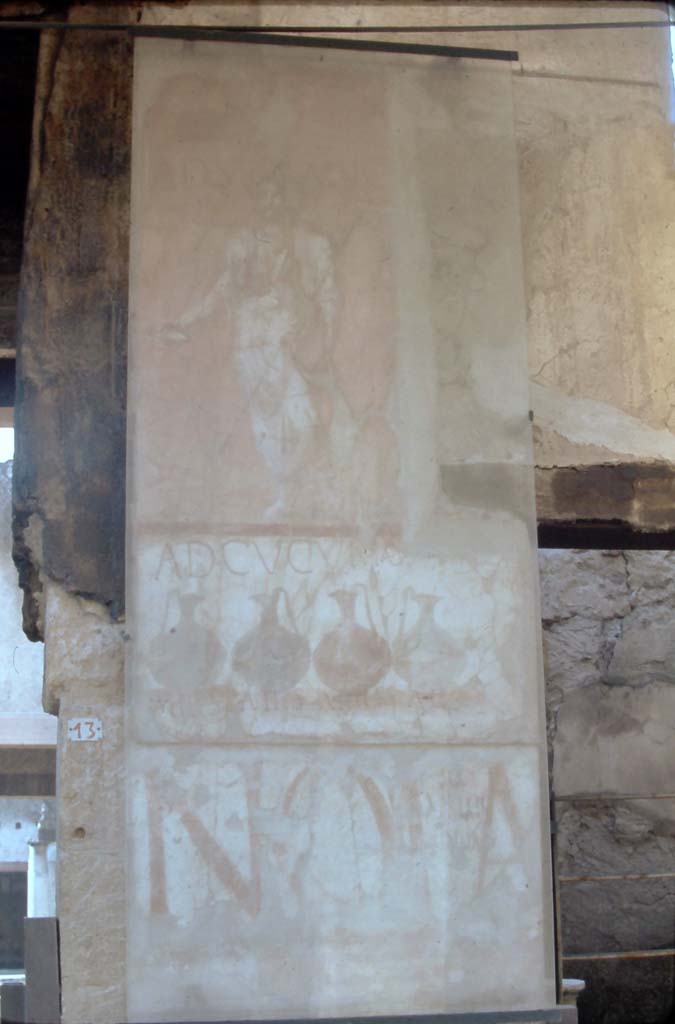 VI.13/14, Herculaneum. 4th December 1971.
Painted sign on pilaster between house entrance and shop. Looking south.
Photo courtesy of Rick Bauer, from Dr George Fay’s slides collection.